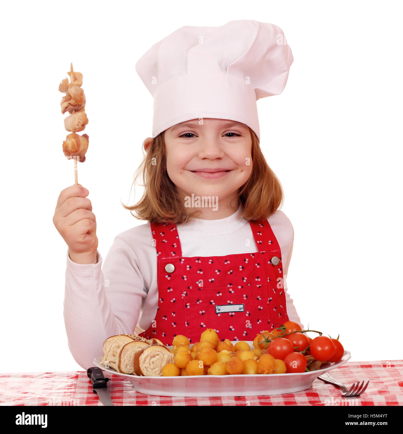 happy little girl cook with grilled chicken meat Stock Photo Alamy