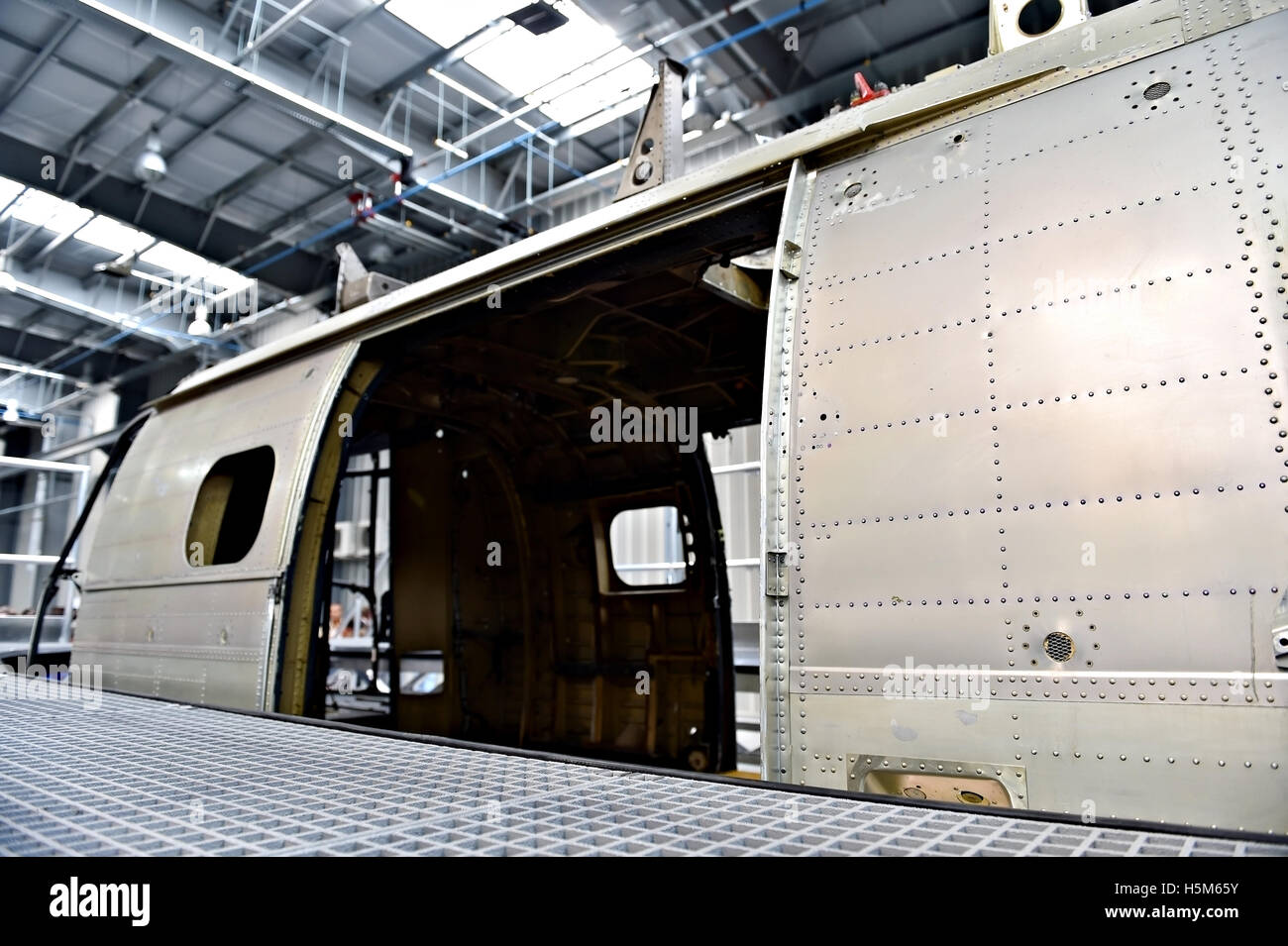 Detail with helicopter fuselage on the repair line in a factory Stock Photo