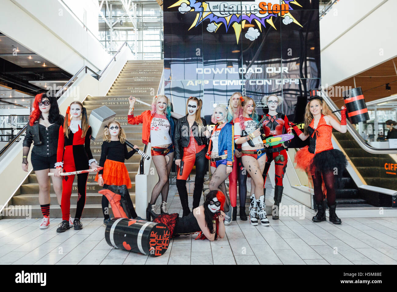 A group of cosplayers wear Harley Quinn costumes, known from the DC Comics-universe, at Comic Con Copenhagen 2016. Stock Photo