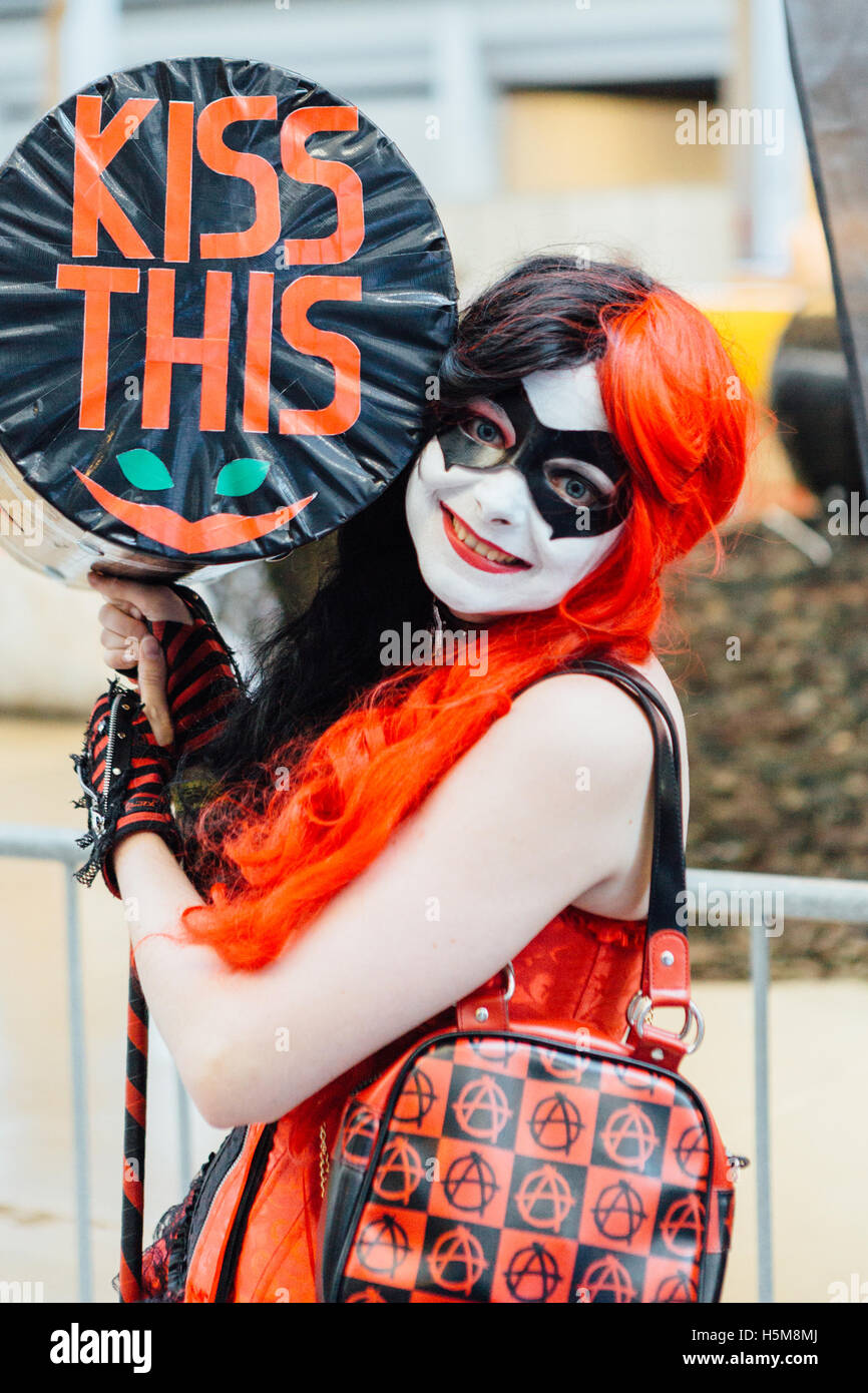 A cosplayer wears a Harley Quinn costume, known from the DC Comics, Batman-universe, at Comic Con Copenhagen 2016. Stock Photo