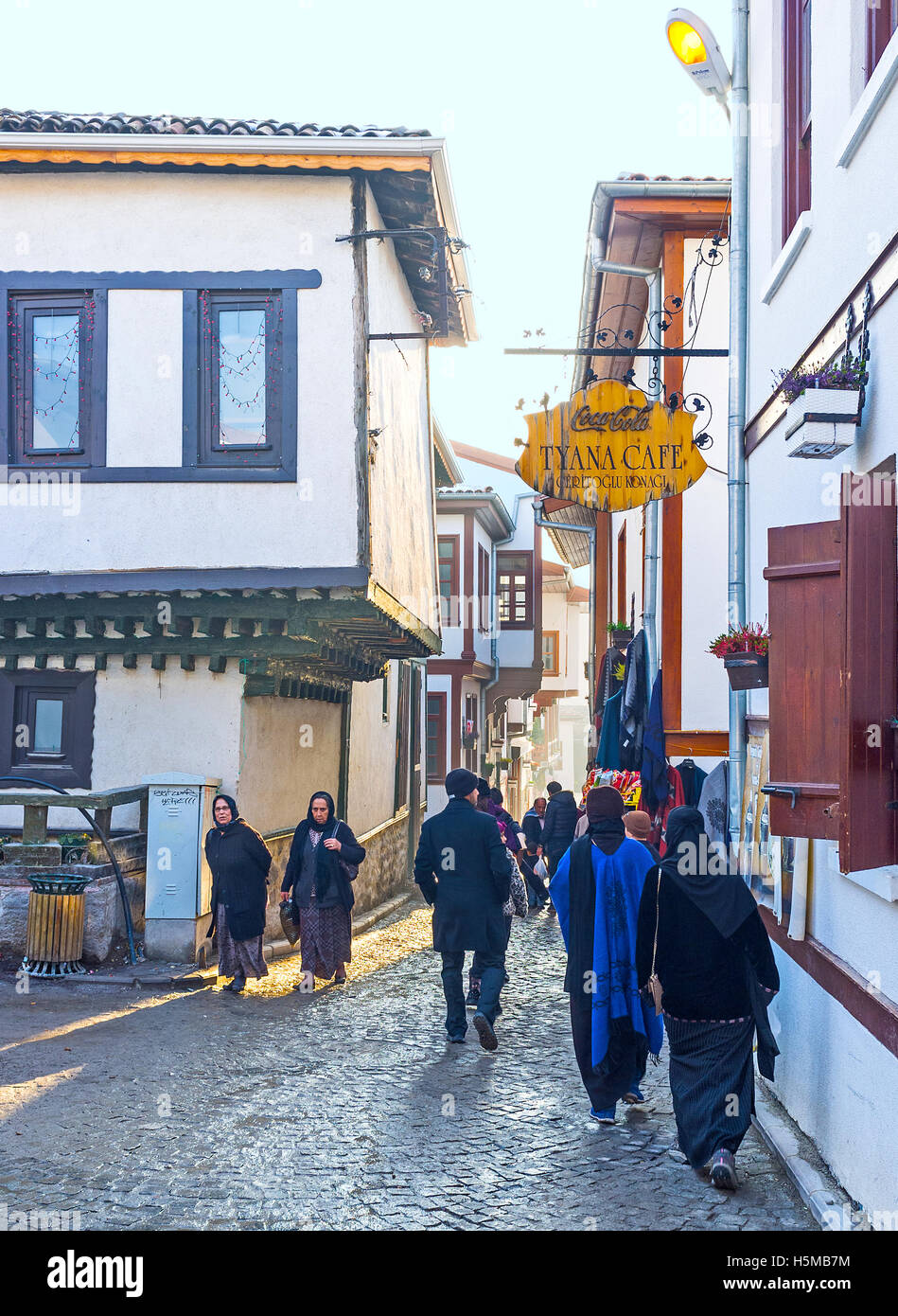 The narrow streets of the Turkish village in old Ankara are full of tourists, climbing on the Castle Hill Stock Photo