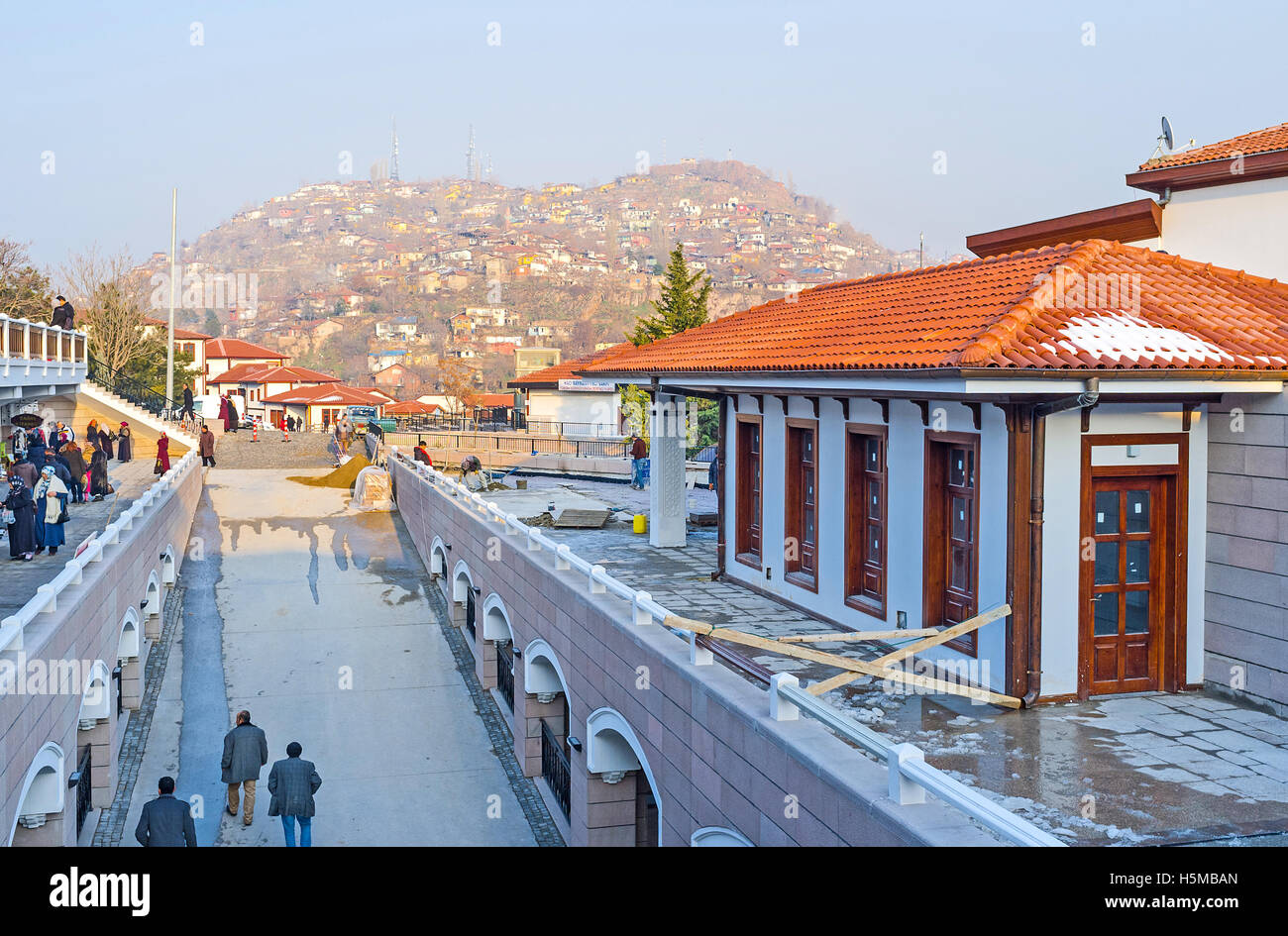 The  modern market street of the old Ankara with the view on the hill with the slums of Ulus district Stock Photo