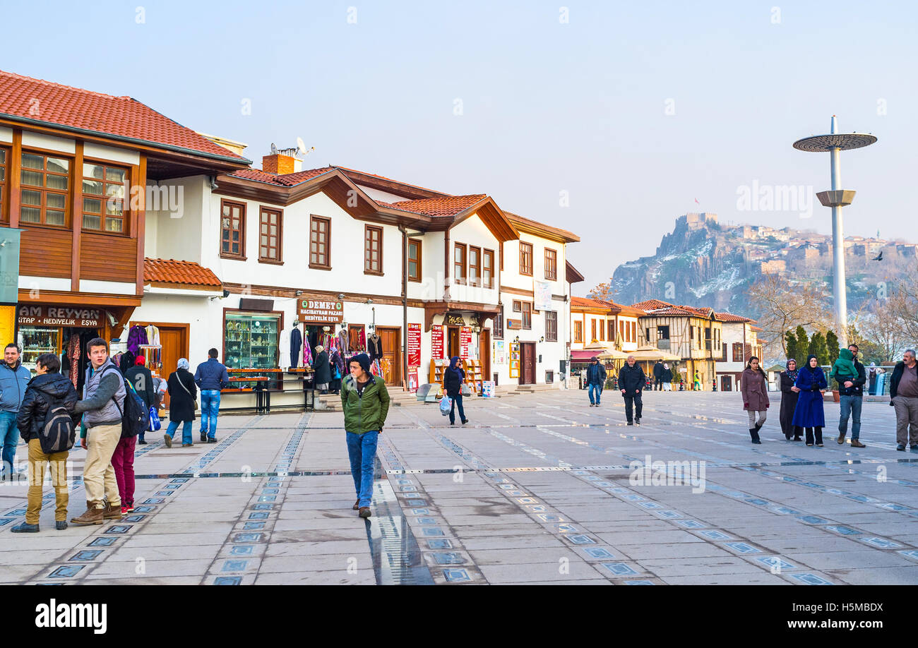 The white renovated cottages with cafes and stores surround the Haci Bayram Square, the most popular tourist place in city Stock Photo