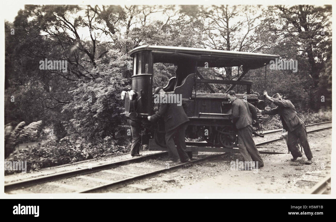 Men turning Pay car on bush line (1947) Stock Photo