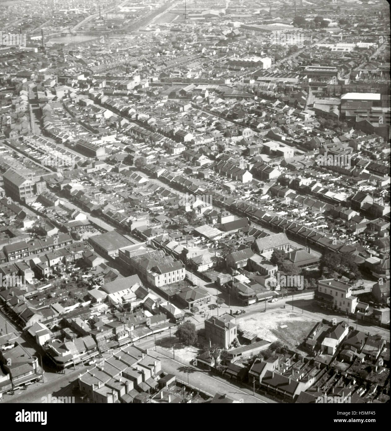 An aerial photograph taken on 25 August 1937, showcasing Erskineville and its surrounding areas. Captured by the Adastra Aerial Photography Collection, it offers a historical perspective of the region. Stock Photo