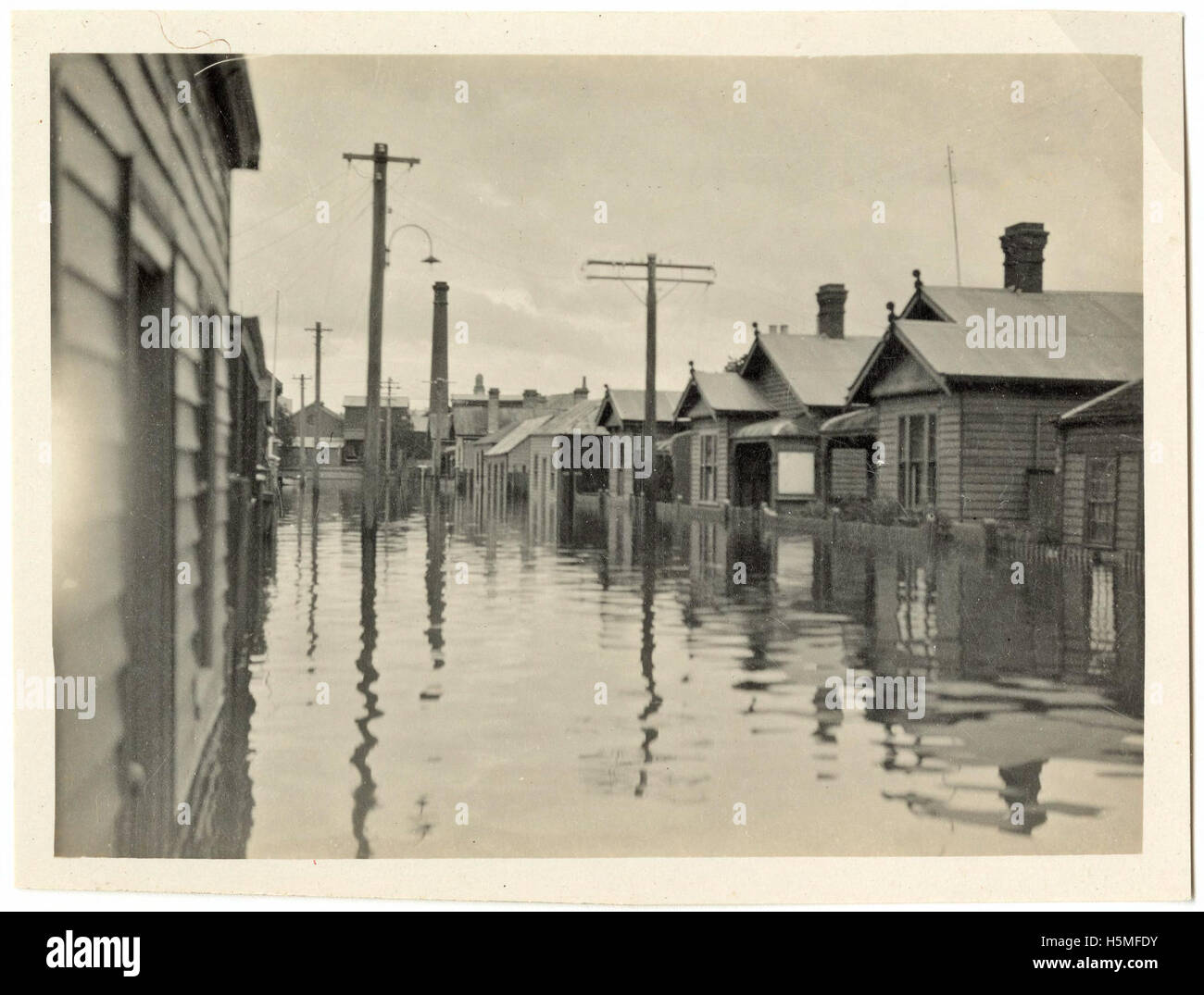 Flooded street and houses, possibly Goodwin Street, Invermay (1929) Stock Photo