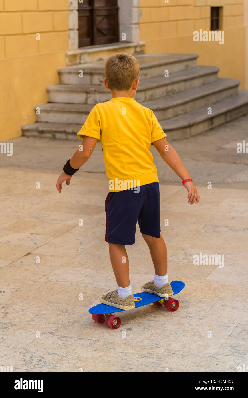 Little boy on skateboard, Krk, Croatia Stock Photo Alamy