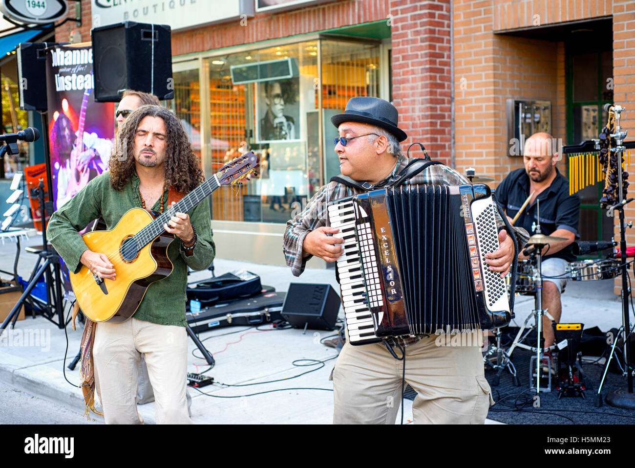 TORONTO, CANADA - AUGUST 22, 2015; Street perfomer during Toronto Jazz festival on Queen street east. Stock Photo