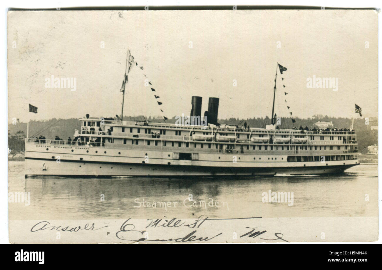 A realphoto postcard showing the steamer S.S. Camden near a harbor