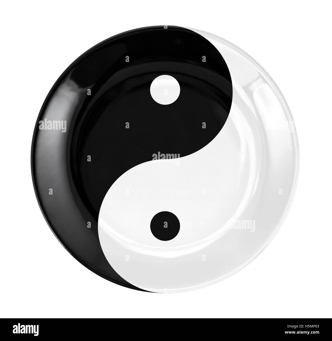 plate with yin yang symbol on white background. concept plate for Japanese and Chinese food. Stock Photo