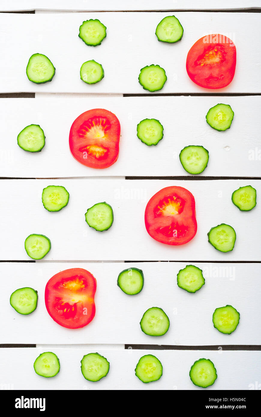 slices of cucumber and red tomatoes Stock Photo - Alamy