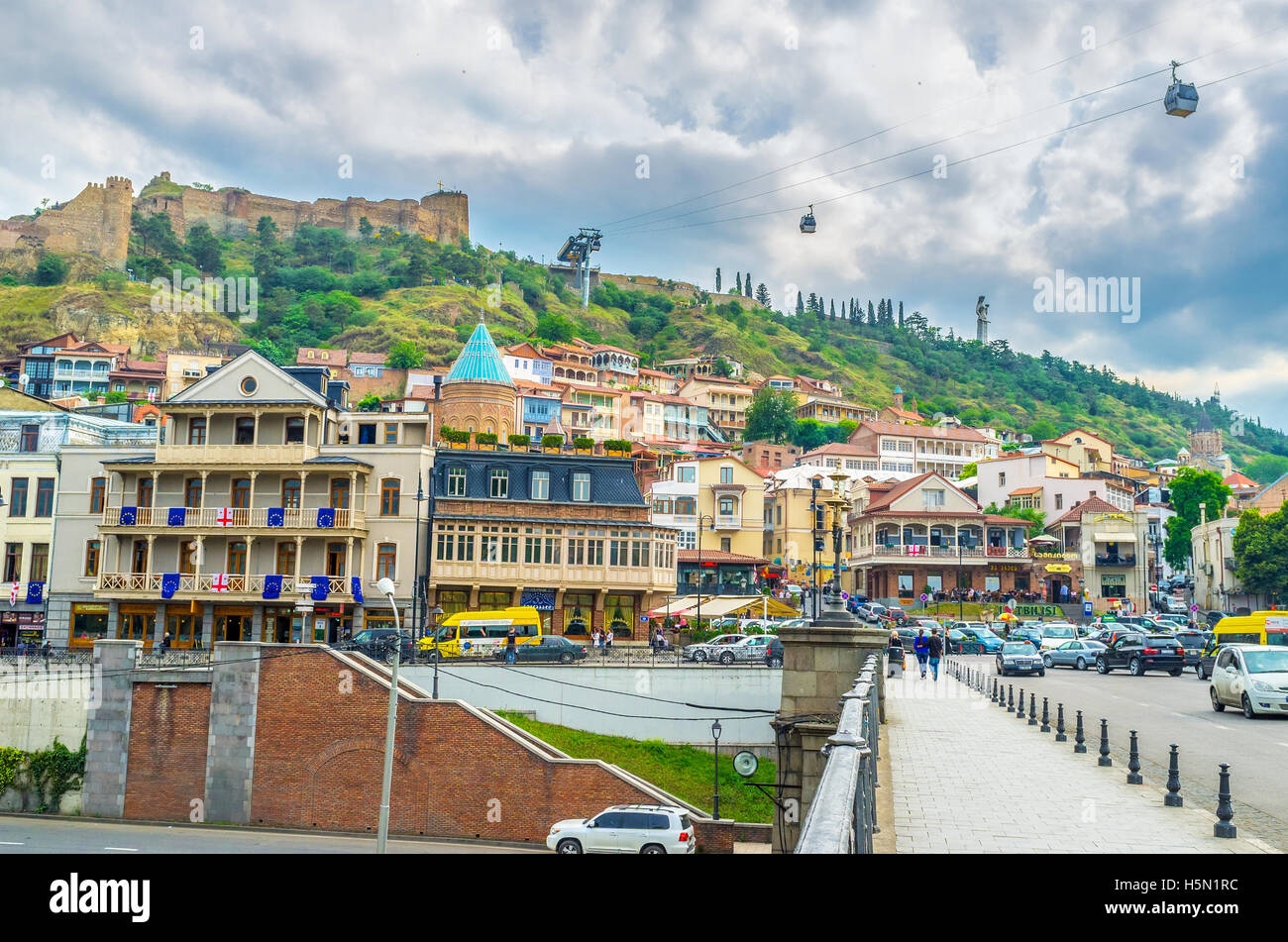 The grey clouds over Vakhtang Gorgasali Square and Sololaki hill ...
