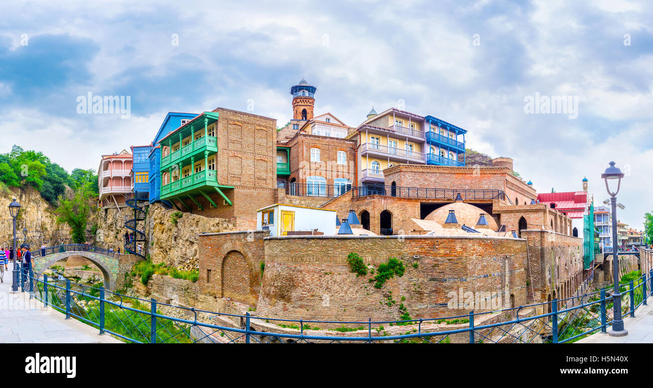 The colorful houses with carved wooden balconies, located on the slope of the Fig Gorge in Abanotubani, Tbilisi Georgia Stock Photo