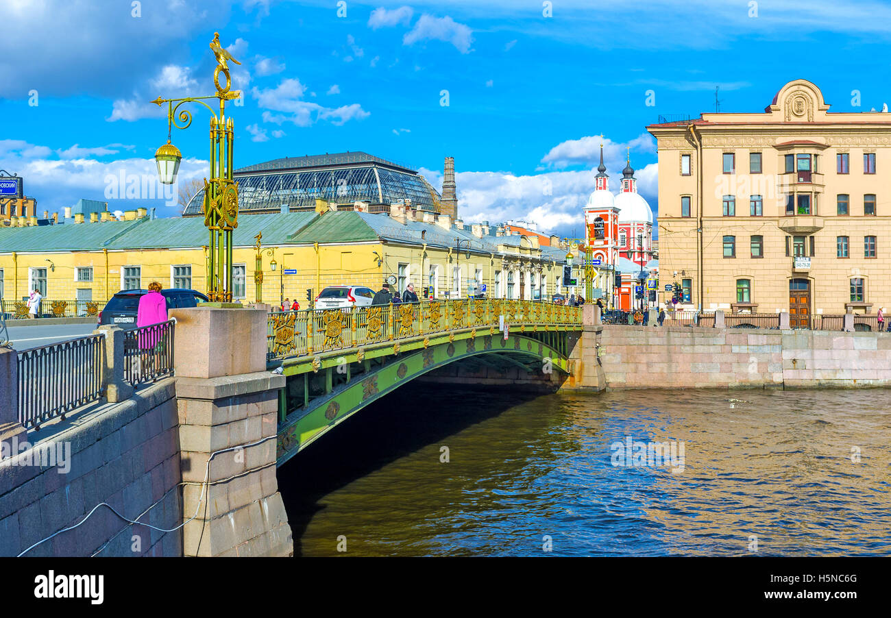The beautiful Panteleimonovsky Bridge over Fontanka River decorated with gilt patterns sculptures and lanterns Stock Photo