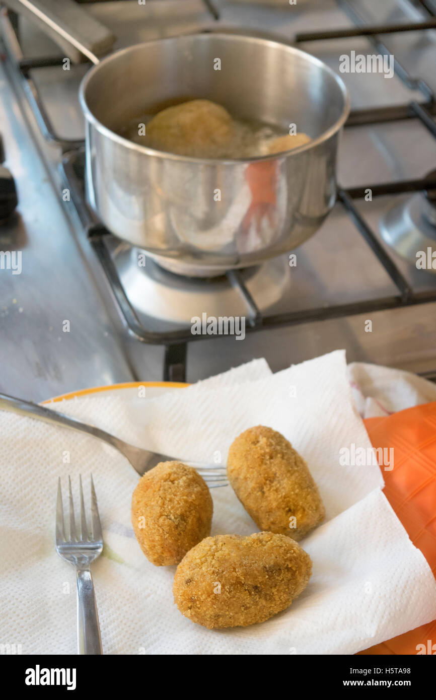 fried sicilian rice balls called arancine Stock Photo