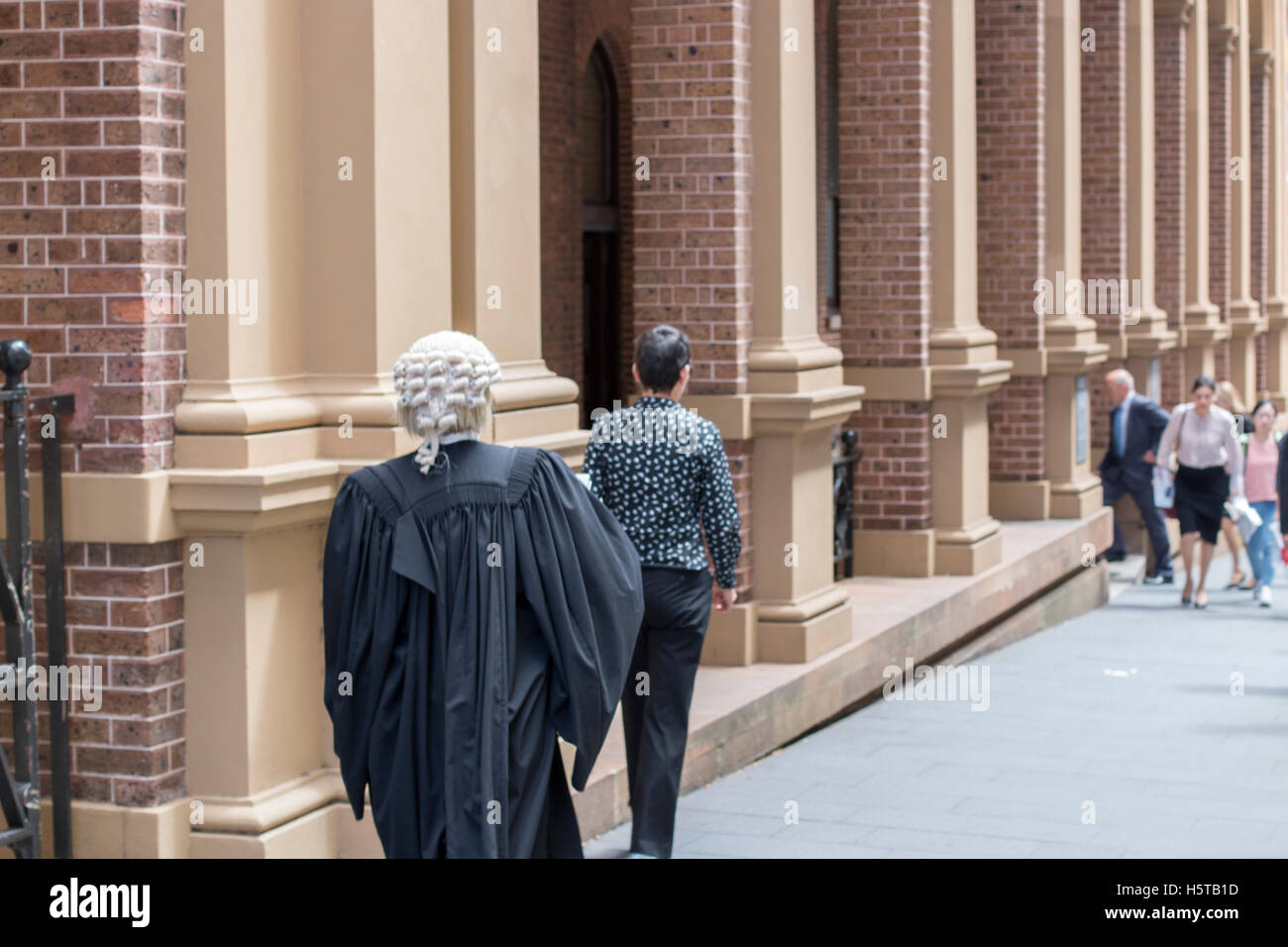 Female barrister entering Supreme Court in phillip street, Sydney, new south wales,Australia Stock Photo