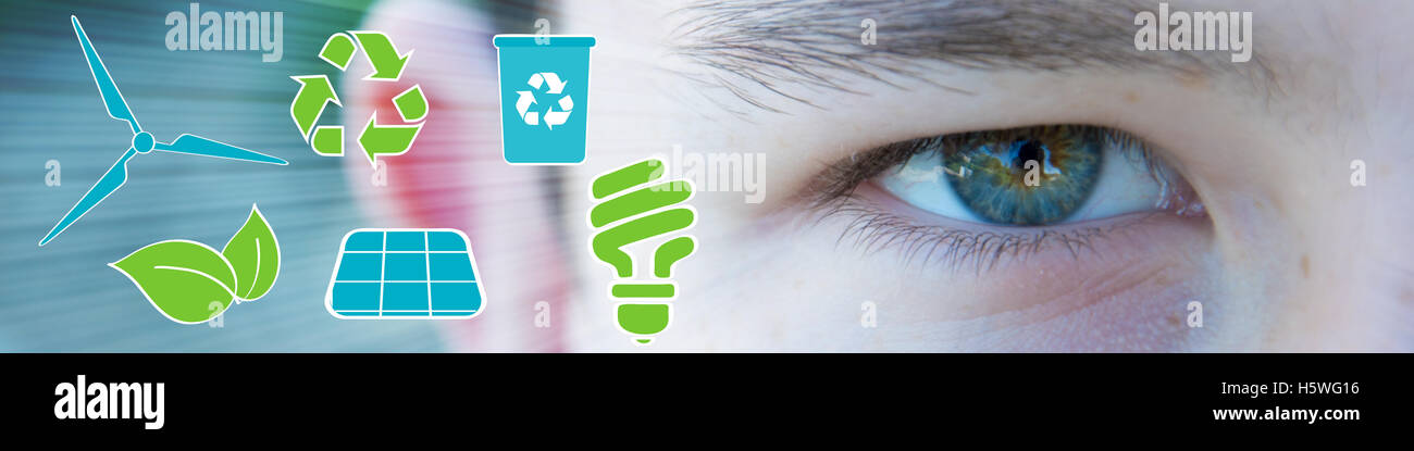 Ecologic eye of boy with green and blue icons Stock Photo