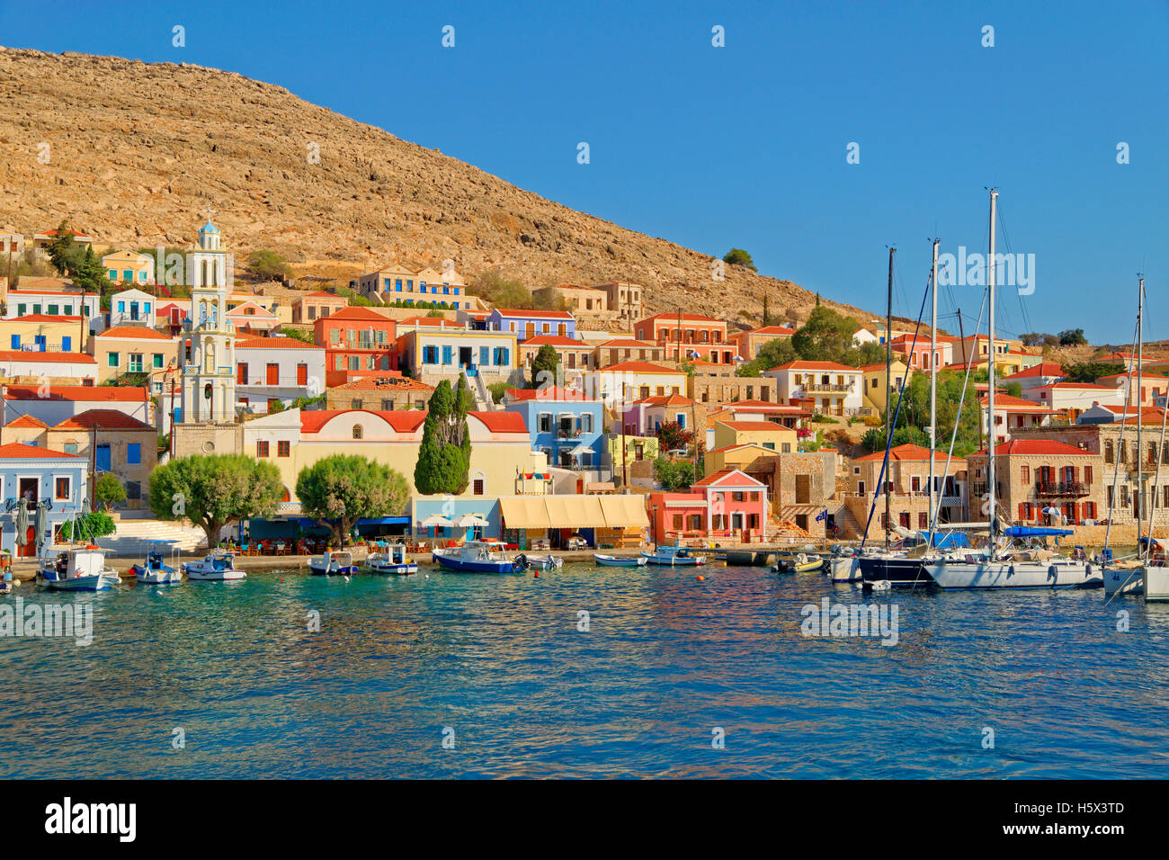 Chalki town on the Greek island of Chalki situated off the north coast of Rhodes in the Dodecanese Island group, Greece. Stock Photo