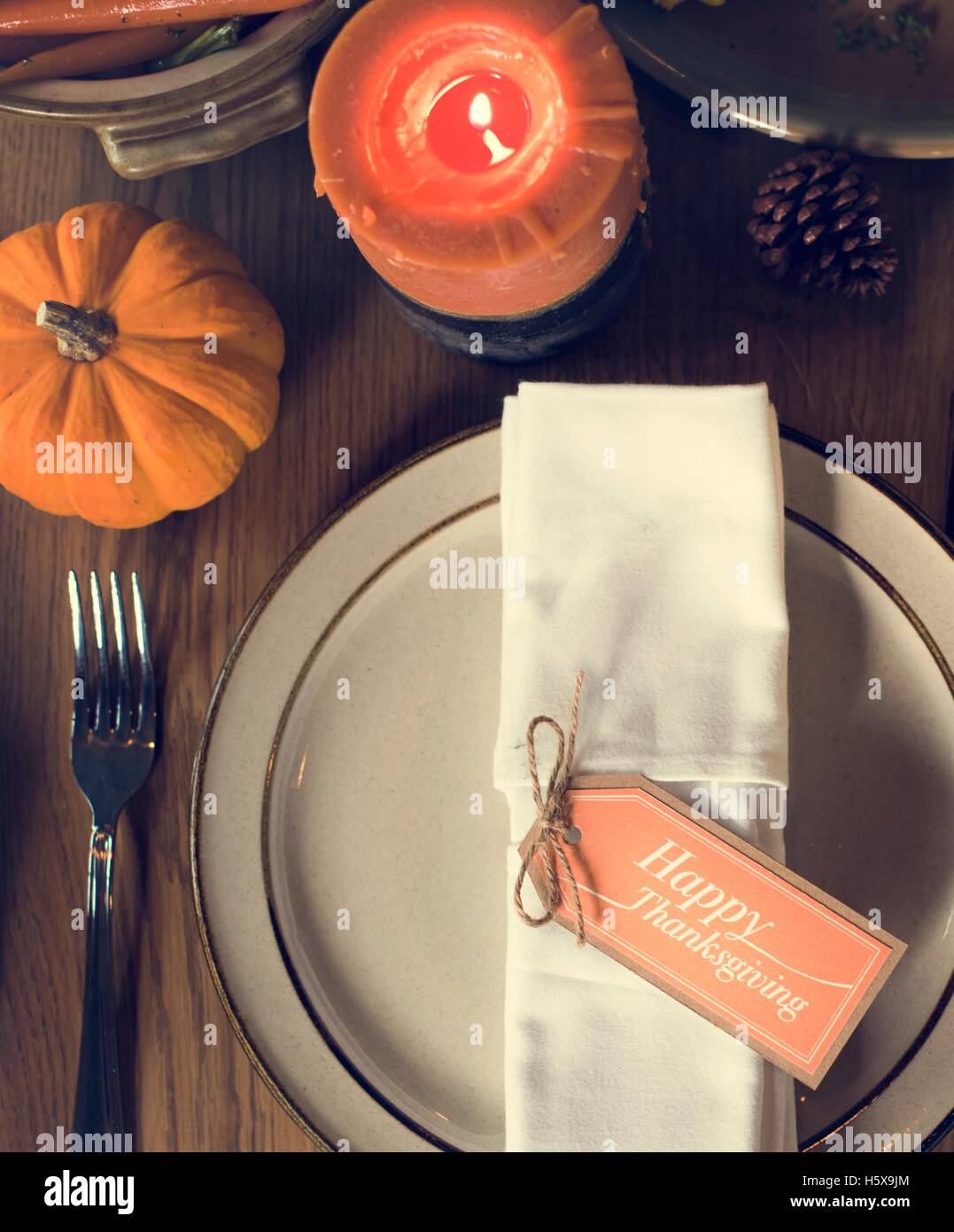 Pumpkin Plate Candle Thanksgiving Table Setting Concept Stock Photo - Alamy
