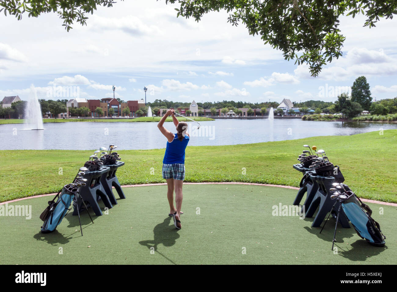 St. Saint Augustine Florida,World Golf Village,Hall of Fame,practice tee,adult adults,woman female women,golfer,lake,water,FL160802024 Stock Photo