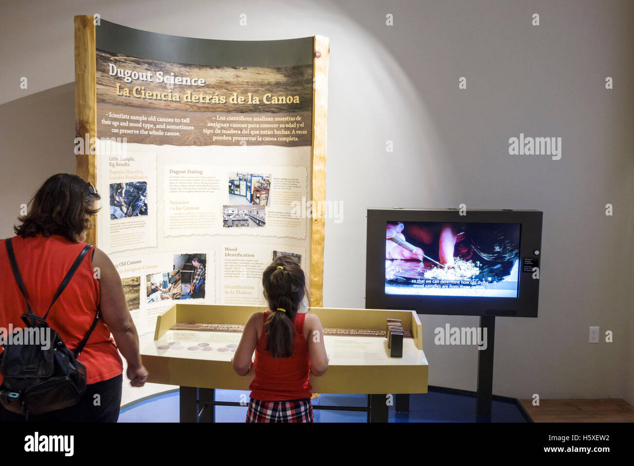St. Saint Augustine Florida,Government House,history museum,exhibit exhibition collection,dugout canoe,mother mom,girl girls,youngster youngsters yout Stock Photo