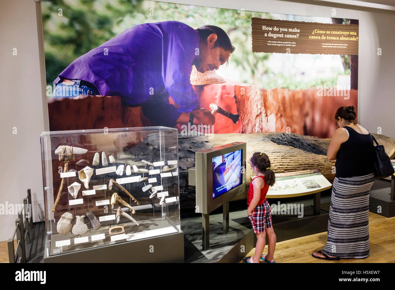 St. Saint Augustine Florida,Government House,history museum,exhibit exhibition collection,dugout canoe,mother mom,girl girls,youngster youngsters yout Stock Photo