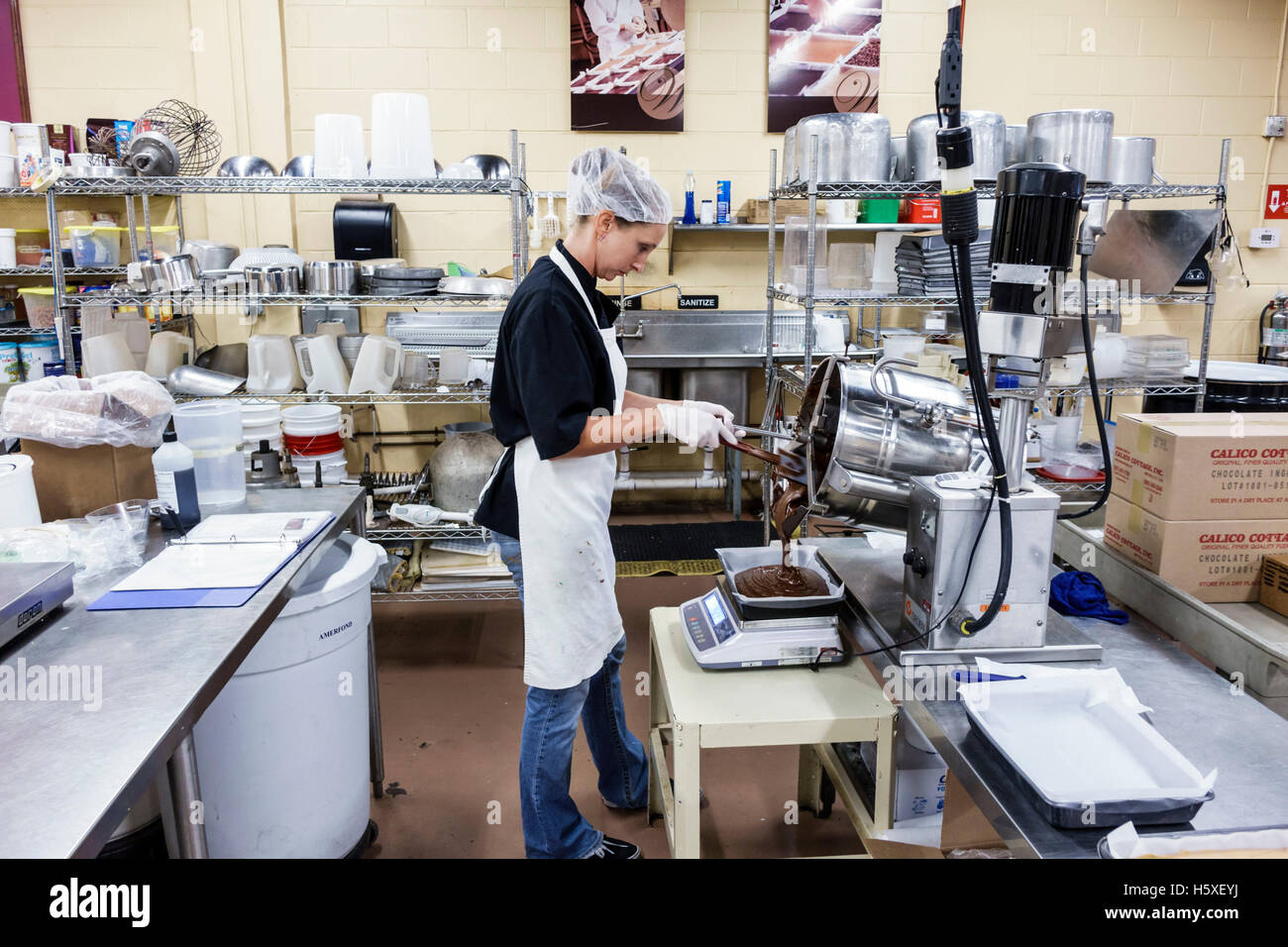 St. Saint Augustine Florida,Whetstone Chocolates,interior inside,factory,production line,fudge,adult adults,woman women female lady,worker,working,wor Stock Photo