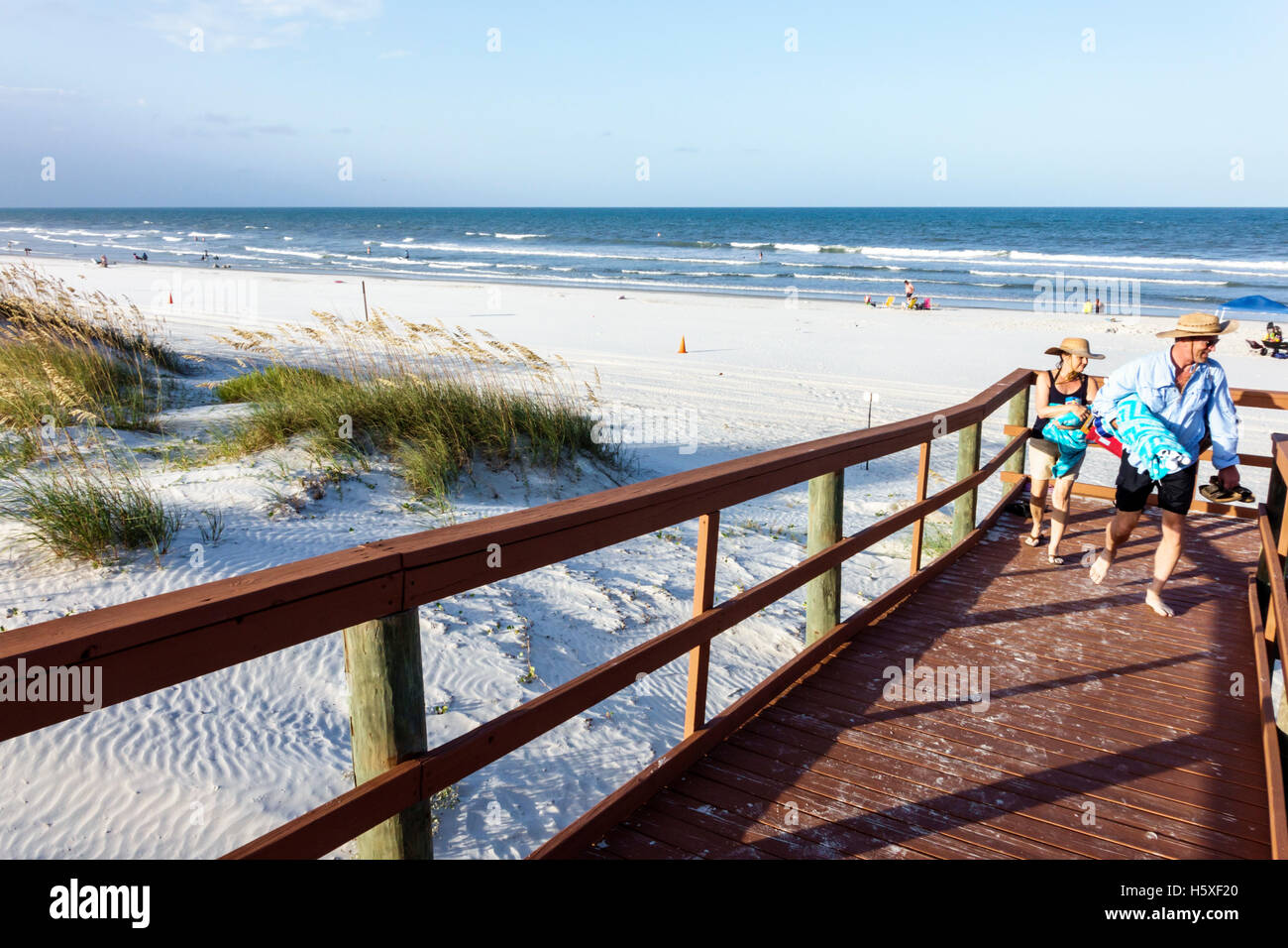 St. Saint Augustine Florida,Beacher's Lodge Ocean waterfront Suites,boardwalk,beach beaches,Atlantic Ocean water,adult,adults,man men male,woman women Stock Photo