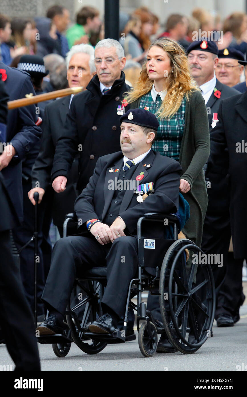 London, UK - November 8, 2015: People take part in Remembrance Day, Poppy Day or Armistice Day, nearst Sunday of 11 every Nov. Stock Photo