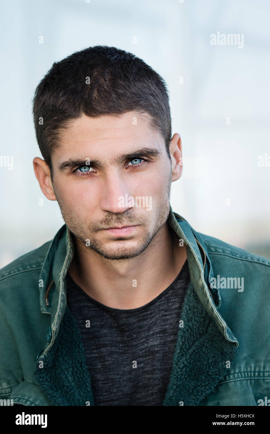 MILAN - JUNE 18: Man with blue eyes and black hair portrait before