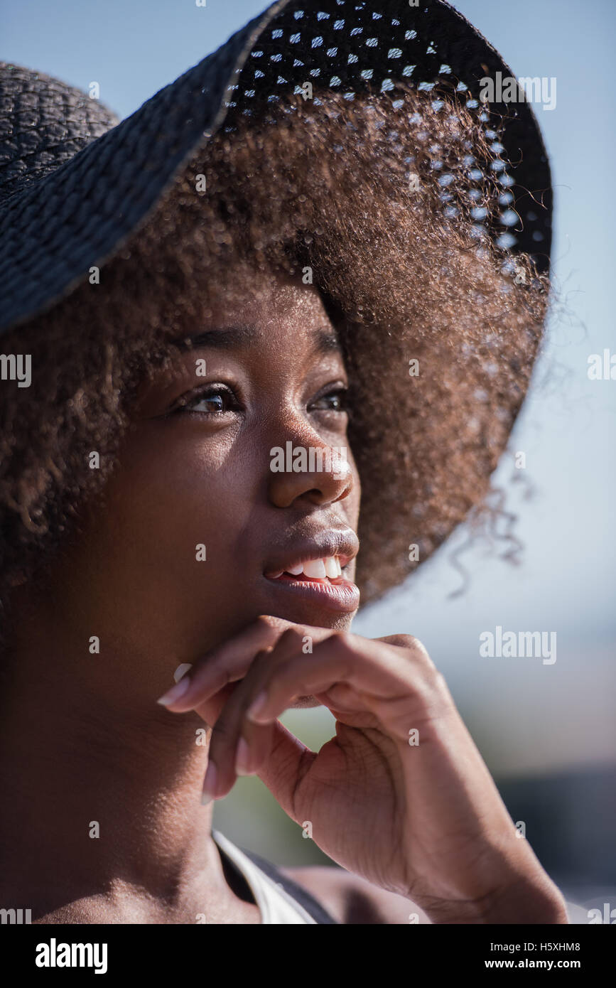 Close up portrait of a beautiful young african american woman smiling ...