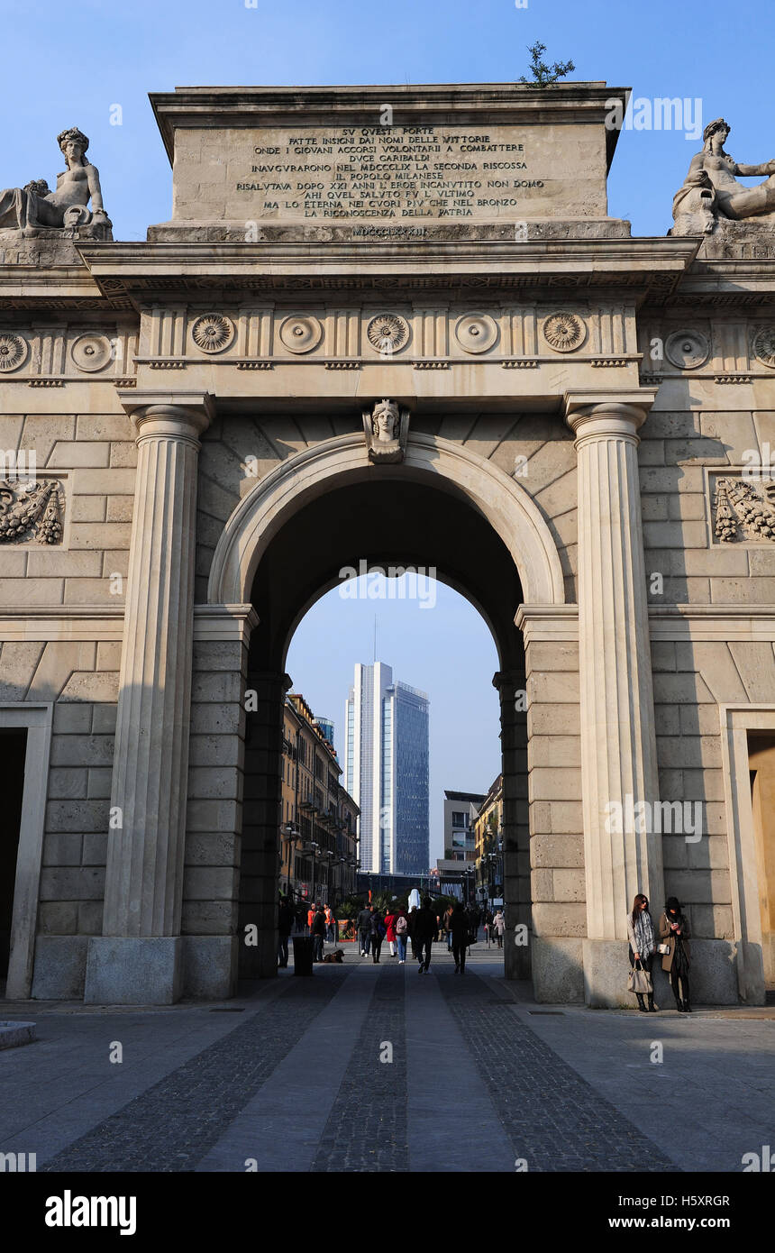 Old and new architecture mix up in contemporary Milan. The arch of Porta Garibaldi and the skyscrapers of Porta Nuova Stock Photo