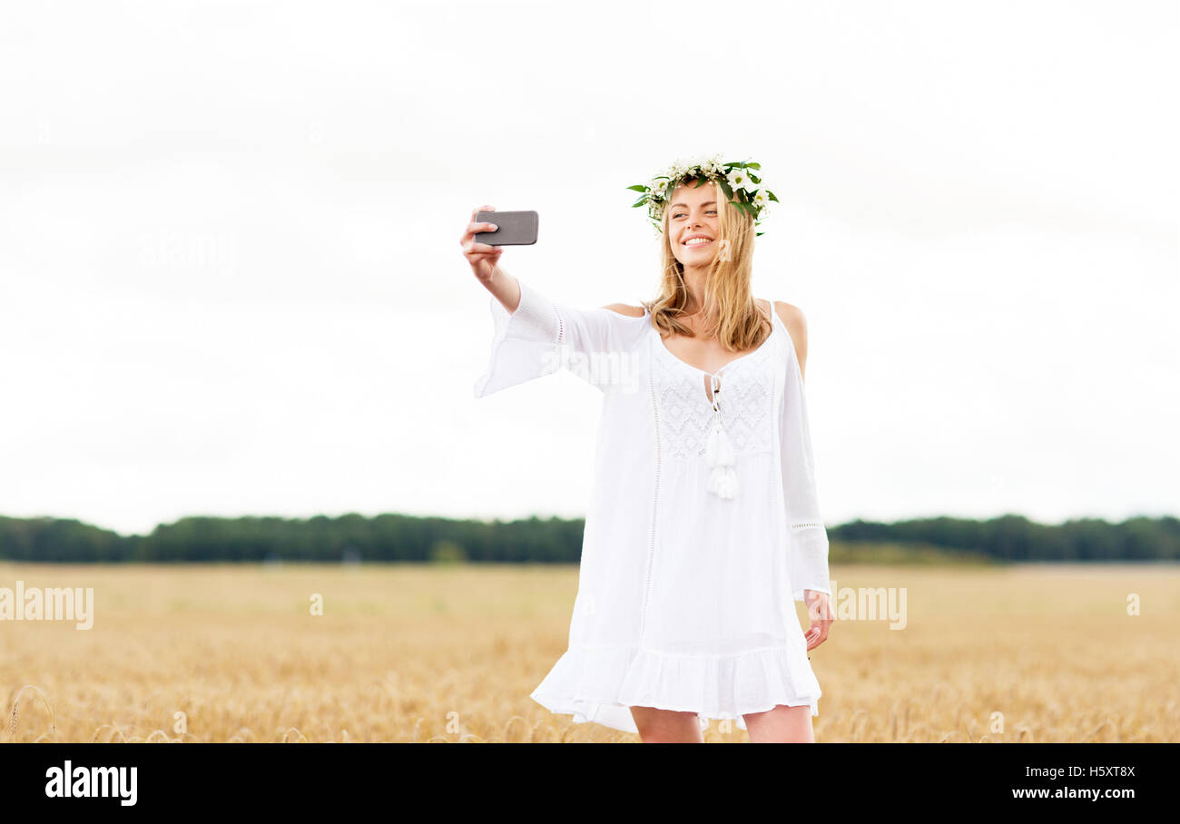 happy young woman taking selfie by smartphone Stock Photo - Alamy