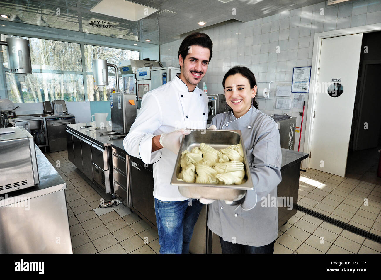 Student Simone Esposito and teacher Luisa Elena Fontana at the Carpigiani gelato university in Anzola nell'Emilia, Italy Stock Photo