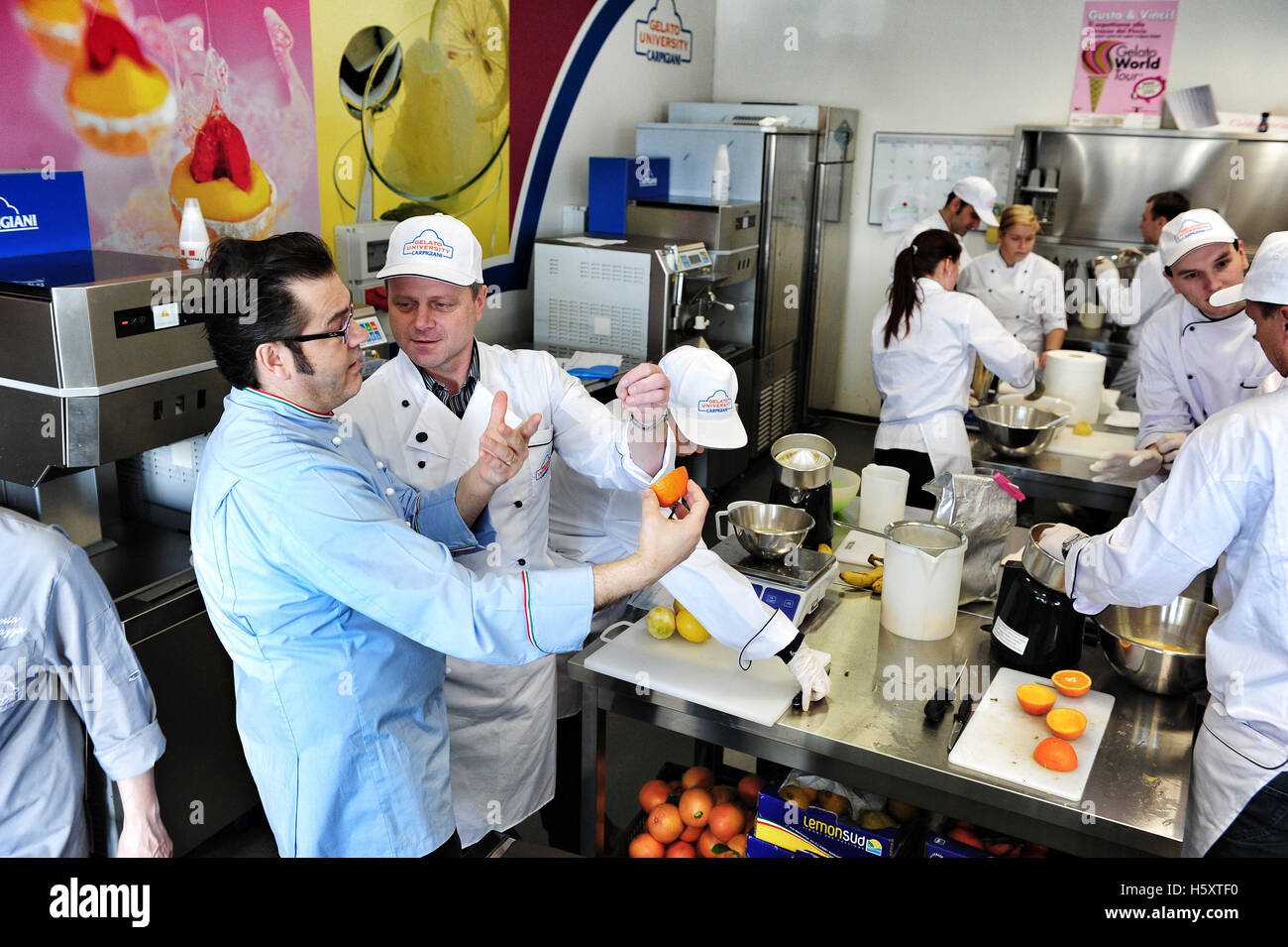 The hustle and bustle of a practical lesson at the Carpigiani Gelato University in Anzola nell'Emilia near Bologna, Italy Stock Photo