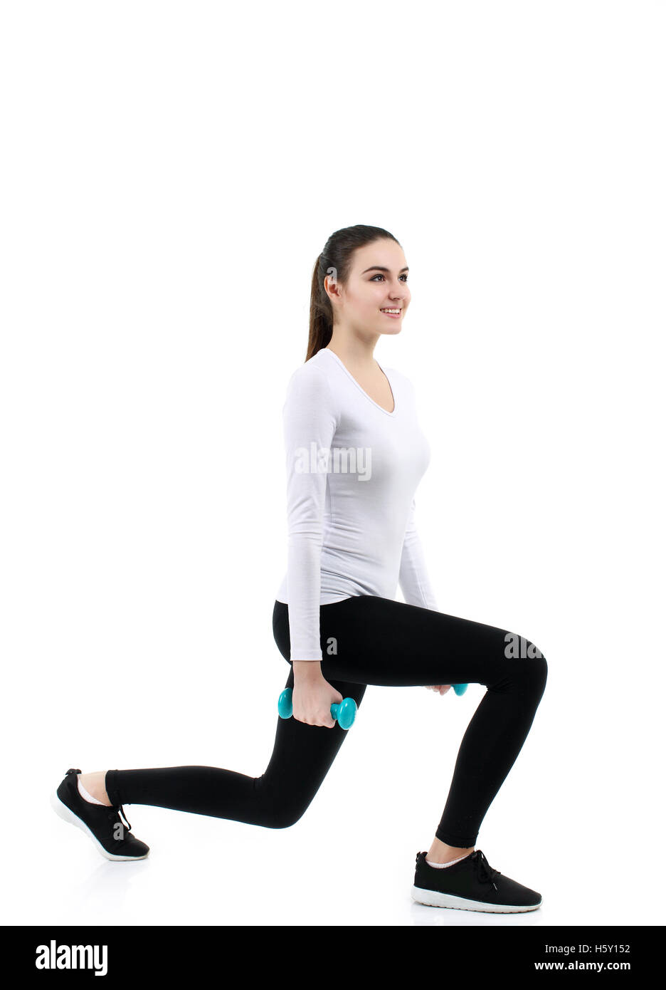 Young healthy fitness woman. Over white background Stock Photo