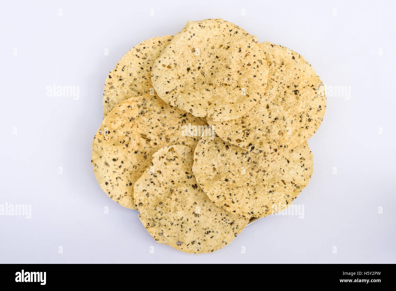 Stack of fried masala papad (traditional Indian crackers Stock Photo