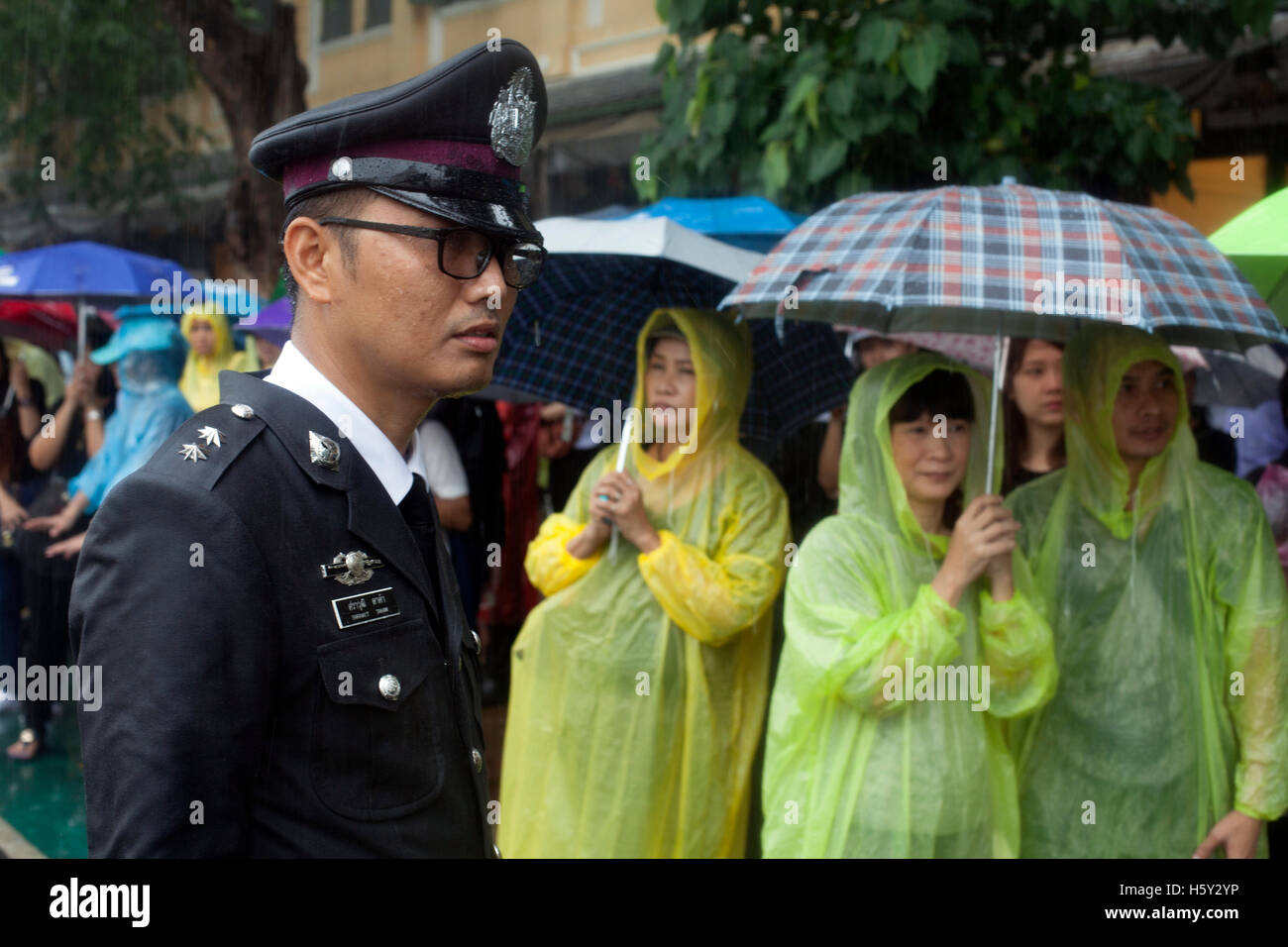 Bangkok residents dress in black, mourning the death of King Bhumibol Adulyadej Stock Photo