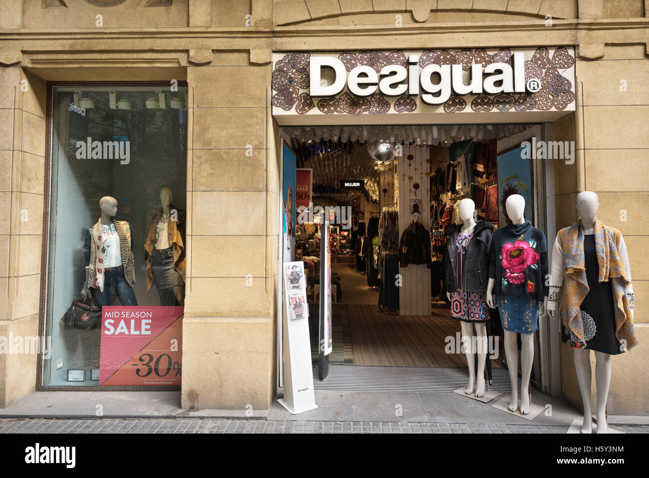 SAN SEBASTIAN, SPAIN - OCTOBER 17, 2016: Desigual fashion store in San Sebastian Spain. Stock Photo