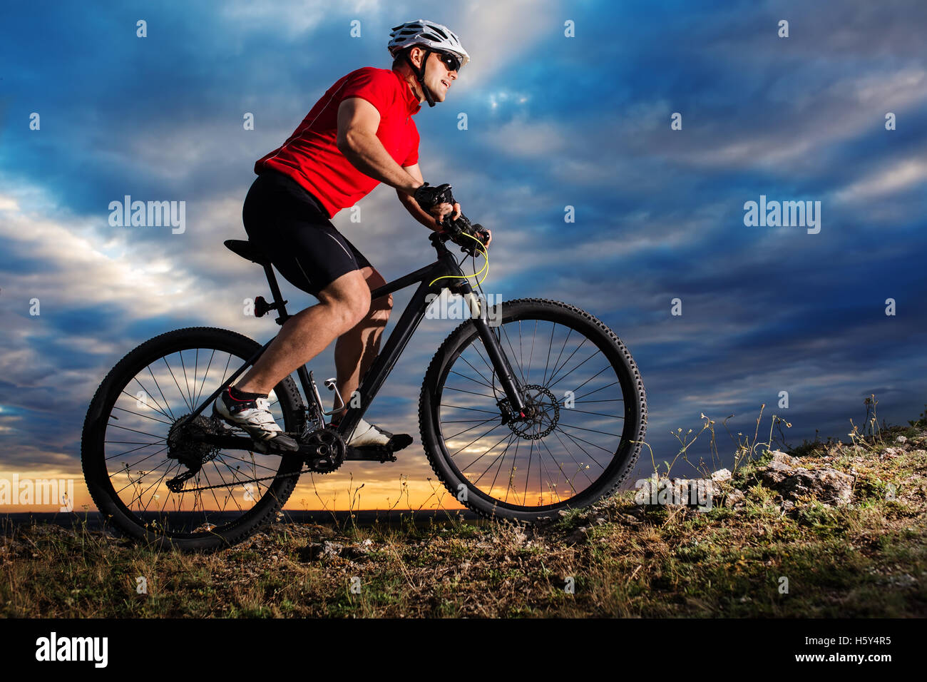 Single Track Riding Mountain biker riding on bike singletrack trail hi-res stock ...