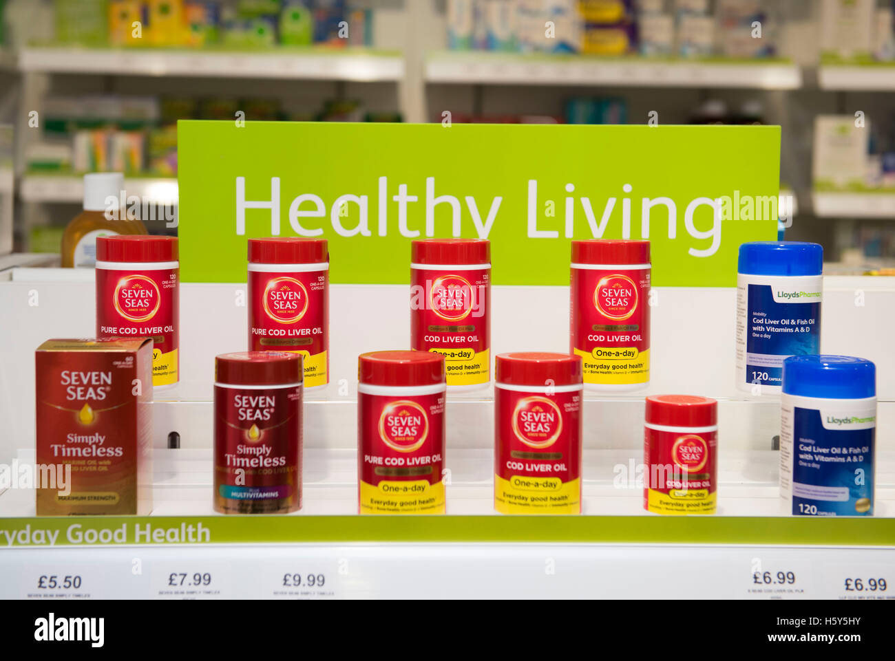 Healthy living cod liver fish oil on display sale on a shelf in a pharmacist store. Stock Photo