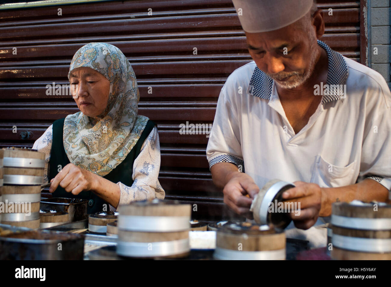 Muslim quarter of Xian, Shaanxi, China, Asia. Silk road, Huimin Street, Beiyuanmen Moslem market. Stall food. Stock Photo