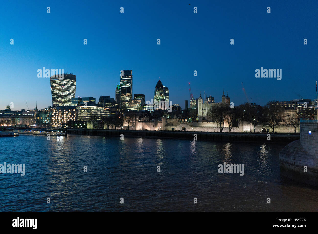 River Thames London by night with City of London skyline Stock Photo ...