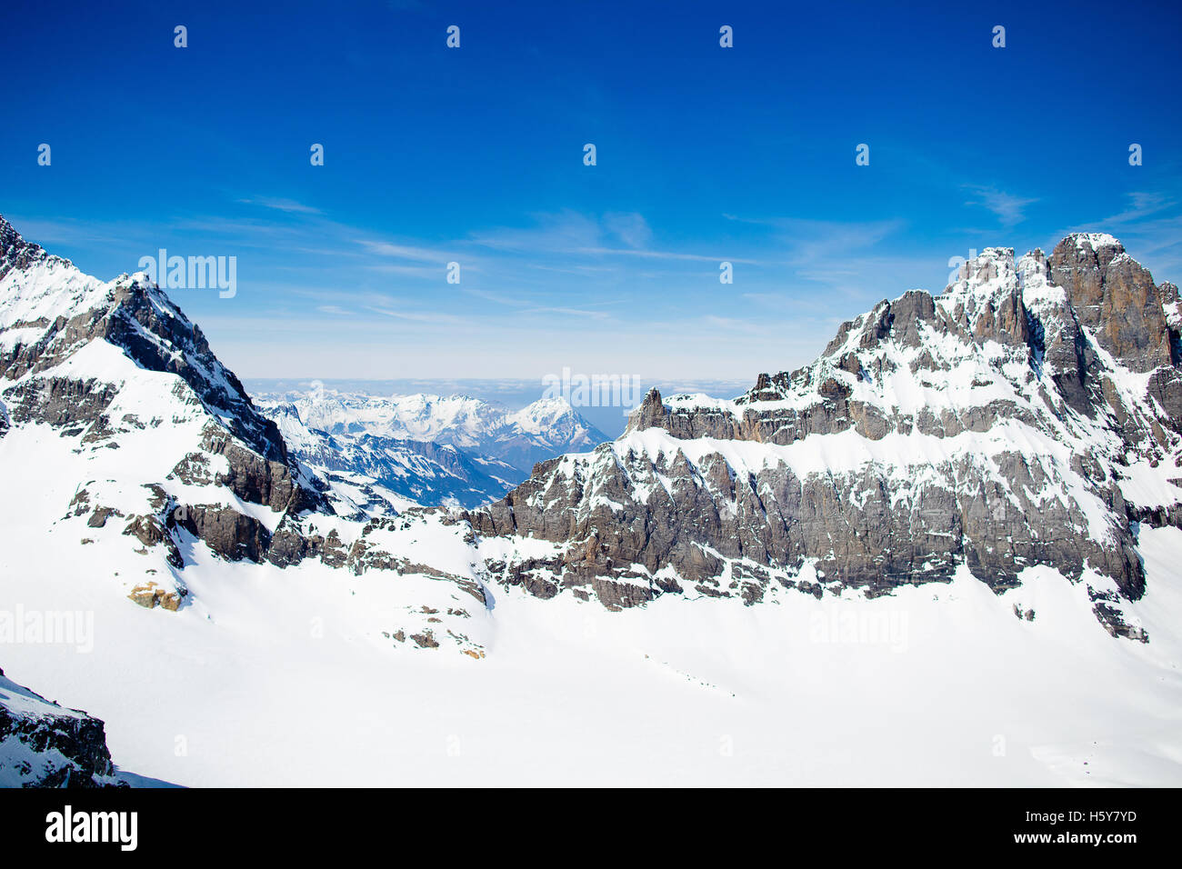 Aerial view of Alps mountains in Switzerland. View from helicopter ...