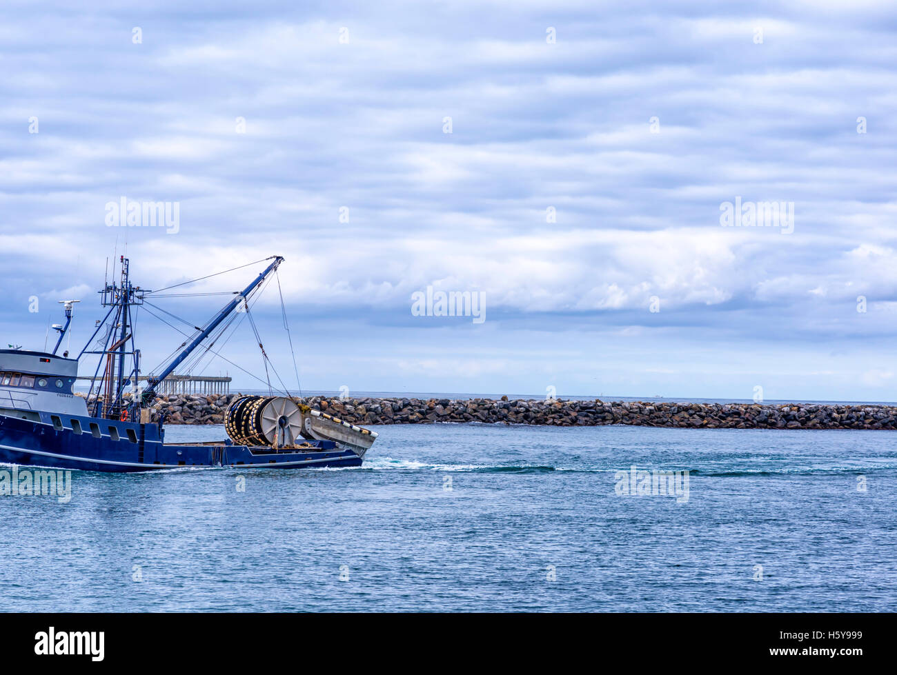 Fishing boat returning home hi-res stock photography and images