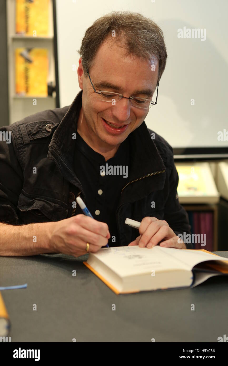 David Safier presenting and signing his new book 'Traumprinz' (lit. 'Dream Prince') at the stand of Rowohlt publisher at the Frankfurt Book Fair in Frankfurt/Main, Germany, 20 October 2016. PHOTO: SUSANNAH V. VERGAU/dpa Stock Photo
