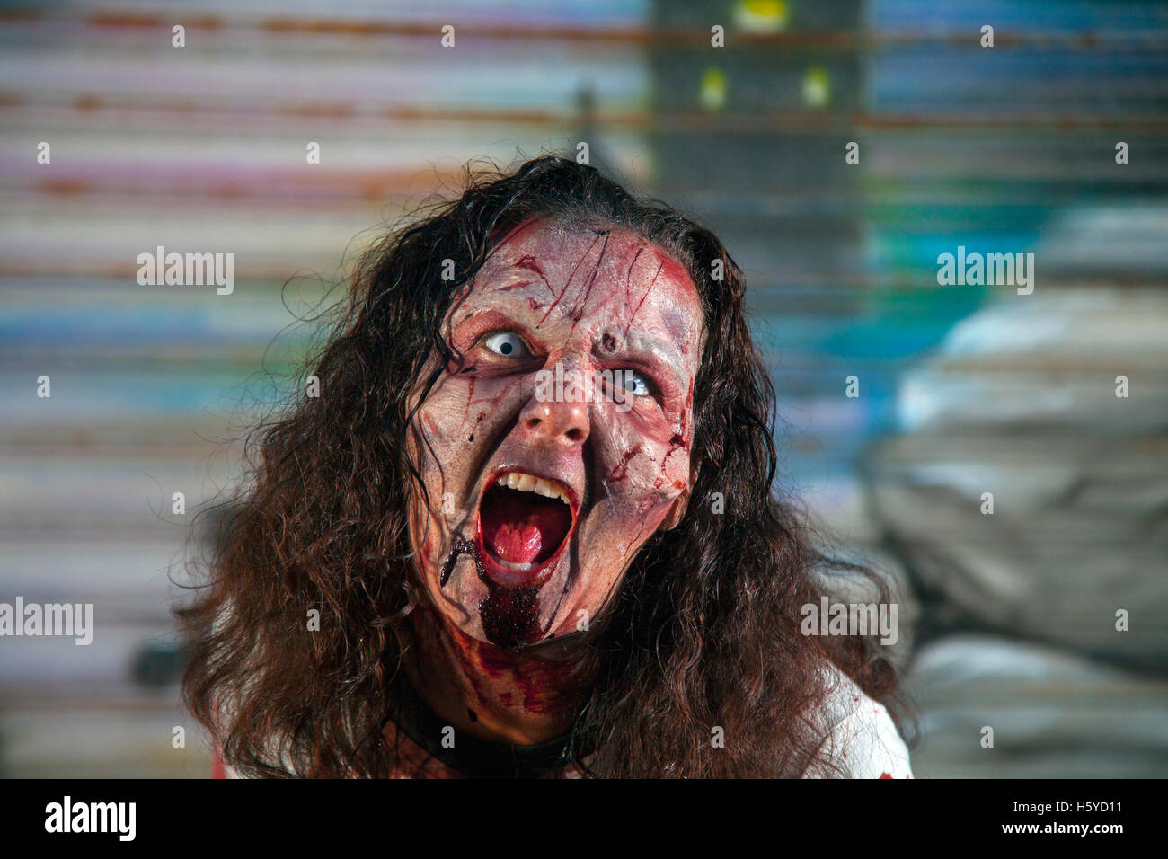 Horror portrait bloodstained soaked night art; Southport, Merseyside, UK, October, 2016. Happy Halloween at Pleasureland, Spookport, Southport’s unique Festival 2016, with spookier, ghoulish goings on than ever before.  Strange, ghostly and spine tingling events have been going on for months in Pleasureland and the attractions continue to build on the approach to All Hallow's Eve as the spirits come out to play. Pleasureland hosts its annual Happy Halloween spectacular, a week packed full of brilliant, Halloween family fancy dress fun figures. Stock Photo