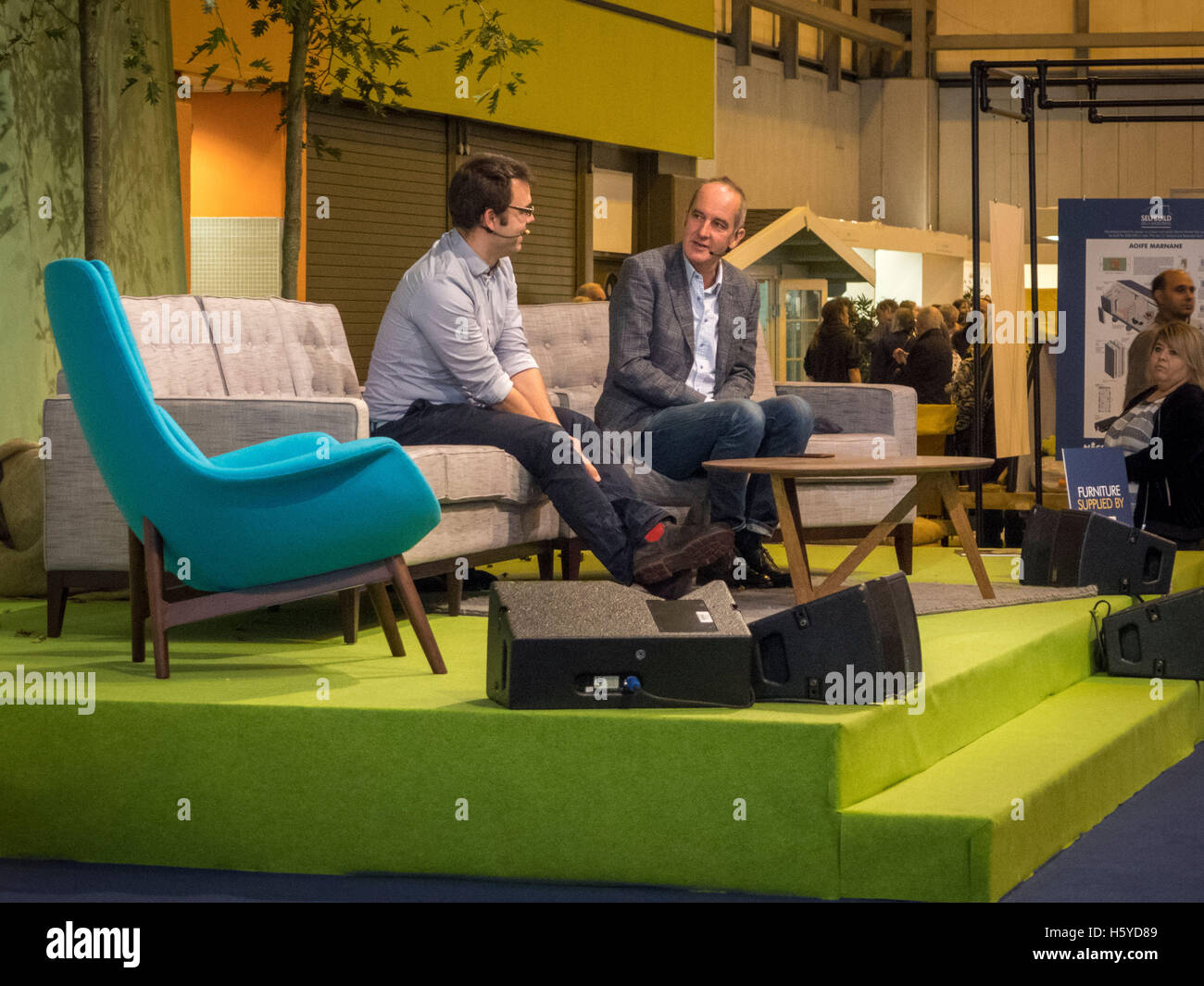 Birmingham, UK. 21st October, 2016. Kevin McCloud, presenter of Grand Designs, interviews architect Matt White in front of a live audience as part of the Grand Designs Live. The show offers visitors a unique opportunity to see all the latest trends for the home as well as many products never seen before. Based on the Channel 4 TV series, and presented by design guru Kevin McCloud, the event is packed with over 500 exhibitors and is open until 23rd October 2016. Photo Bailey-Cooper Photography/Alamy Live News Stock Photo