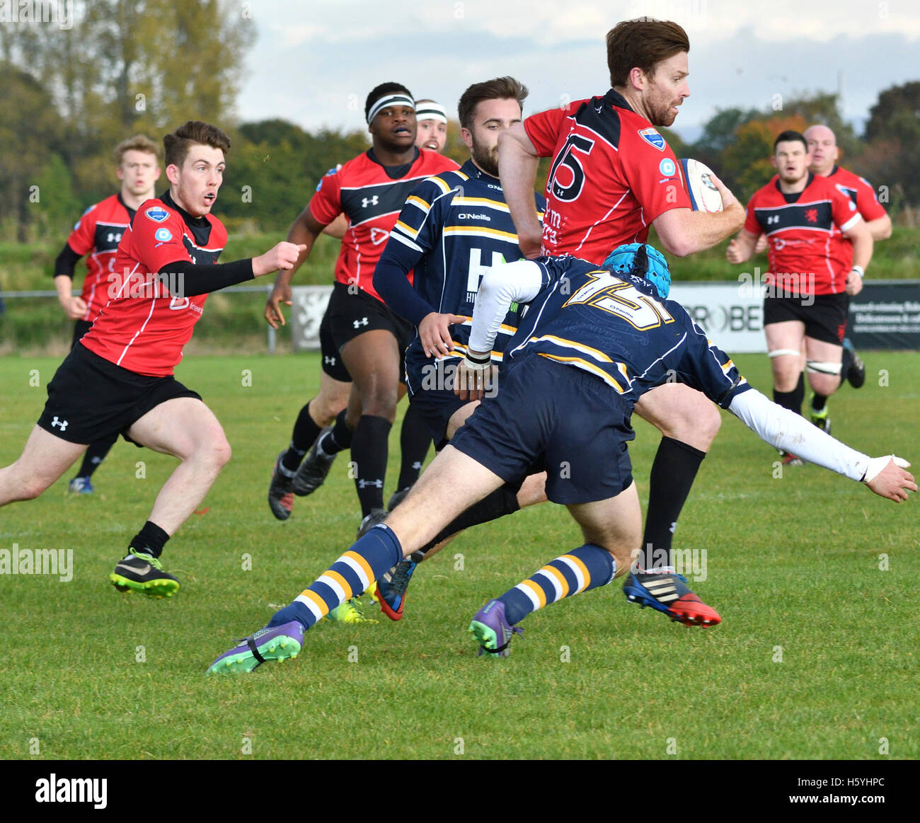 Manchester  UK  22nd October 2016  Action from the South Lancs/Cheshire Division 1 match between Broughton Park, in red, and Anselmians, in hoops. Broughton Park win 59-12 to move to fourth in the table. Stock Photo