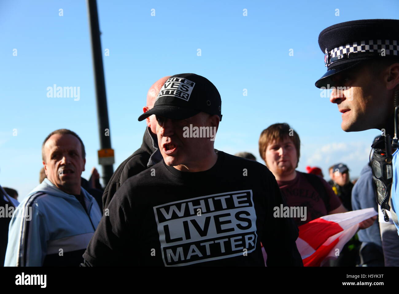Margate, Kent, UK. 22nd October, 2016. A man with white lives matter shirt. The right wing group White Lives Matter (WLM) march in the town. This is the first WLM demonstration in the UK. A counter demonstration, Margate Rocks Against Racism (MRAR) is taking place in the town at the same time. Penelope Barritt/Alamy Live News Stock Photo